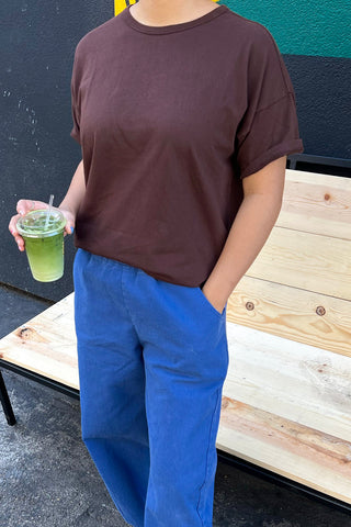 Her Tee